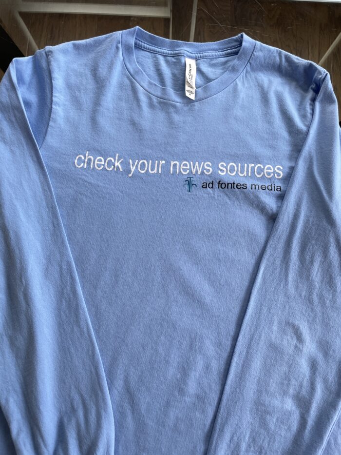 Long-sleeved shirt: "check your news sources" - Image 2