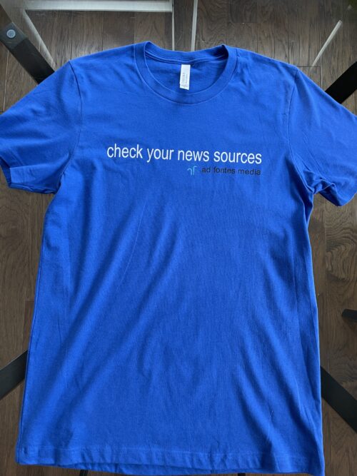 royal blue T-shirt "Check Your News Sources"