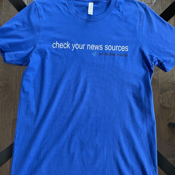 royal blue T-shirt "Check Your News Sources"